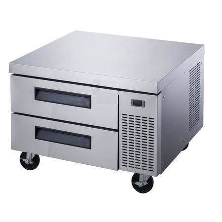 a stainless steel counter with two drawers and wheels