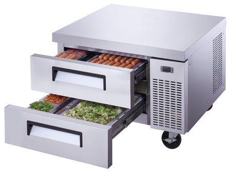 a food prep table with a drawer full of food