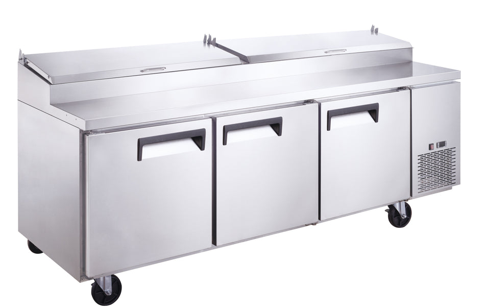 a three door freezer sitting on wheels on a white background