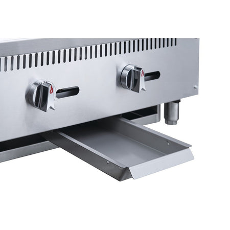 a stainless steel grill with two burners on the side