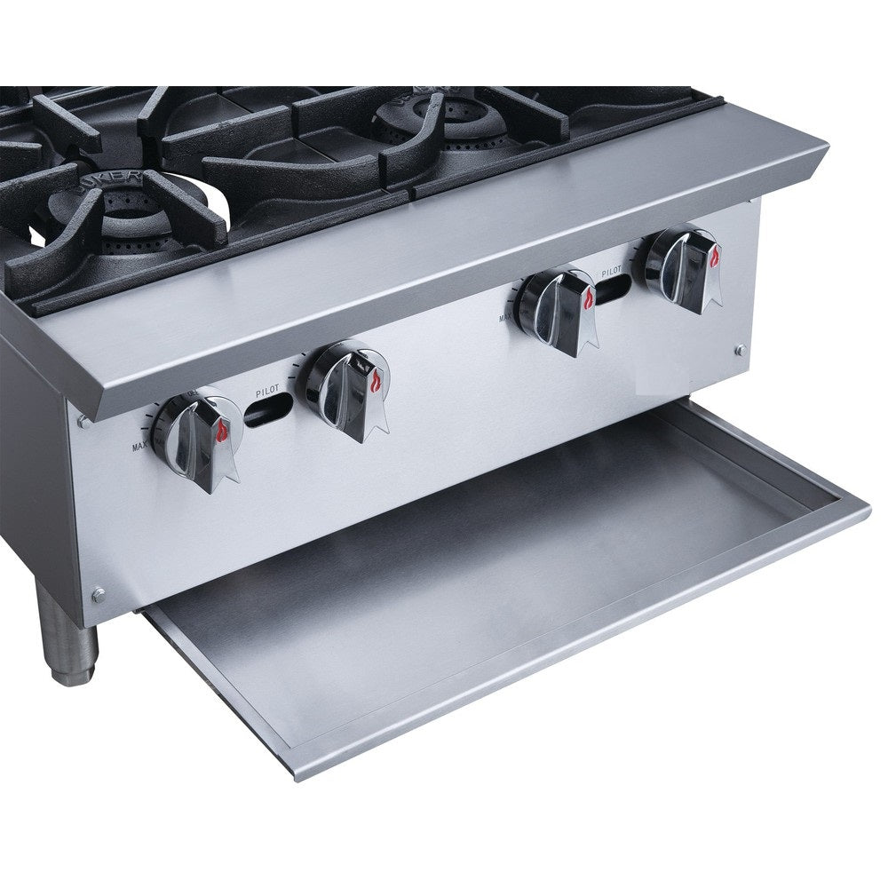 a stainless steel stove top with four burners
