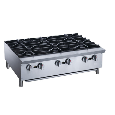 a stainless steel stove top with four burners
