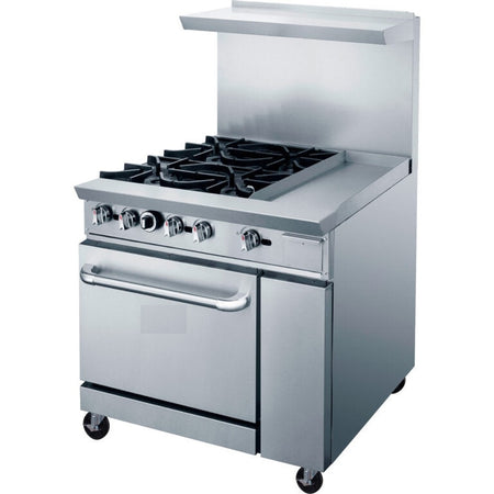 a silver stove top oven sitting on top of a counter