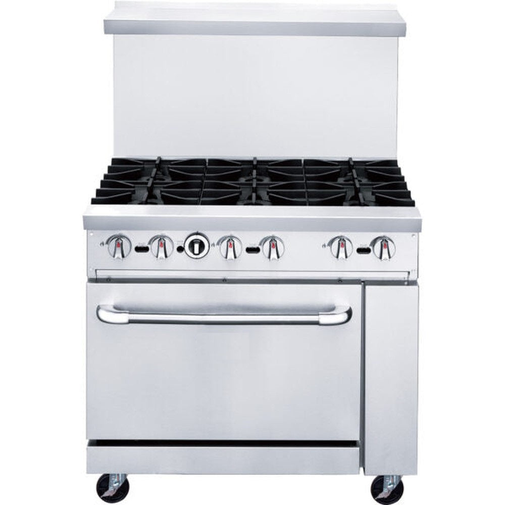 a stainless steel stove with four burners and two ovens