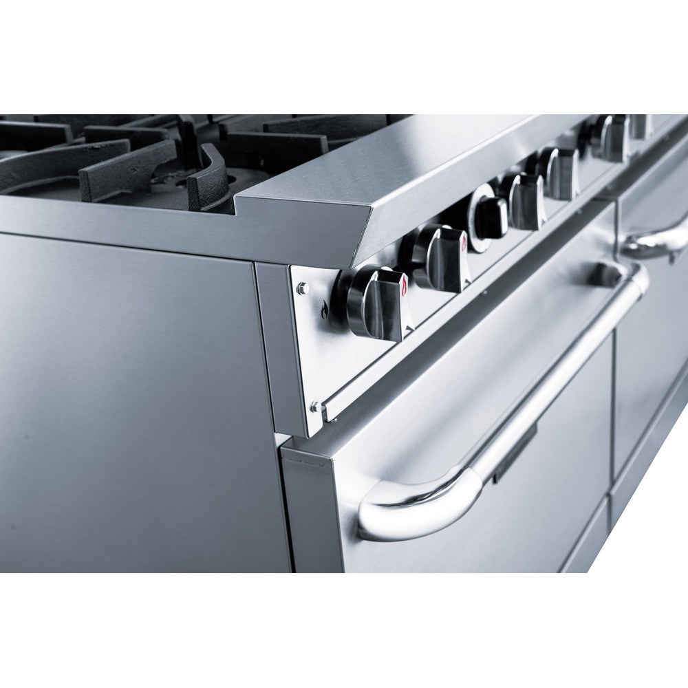 a stainless steel stove top oven with four burners