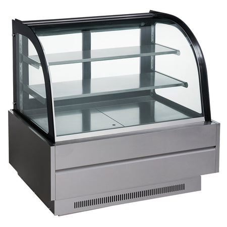 a display case with a curved glass front